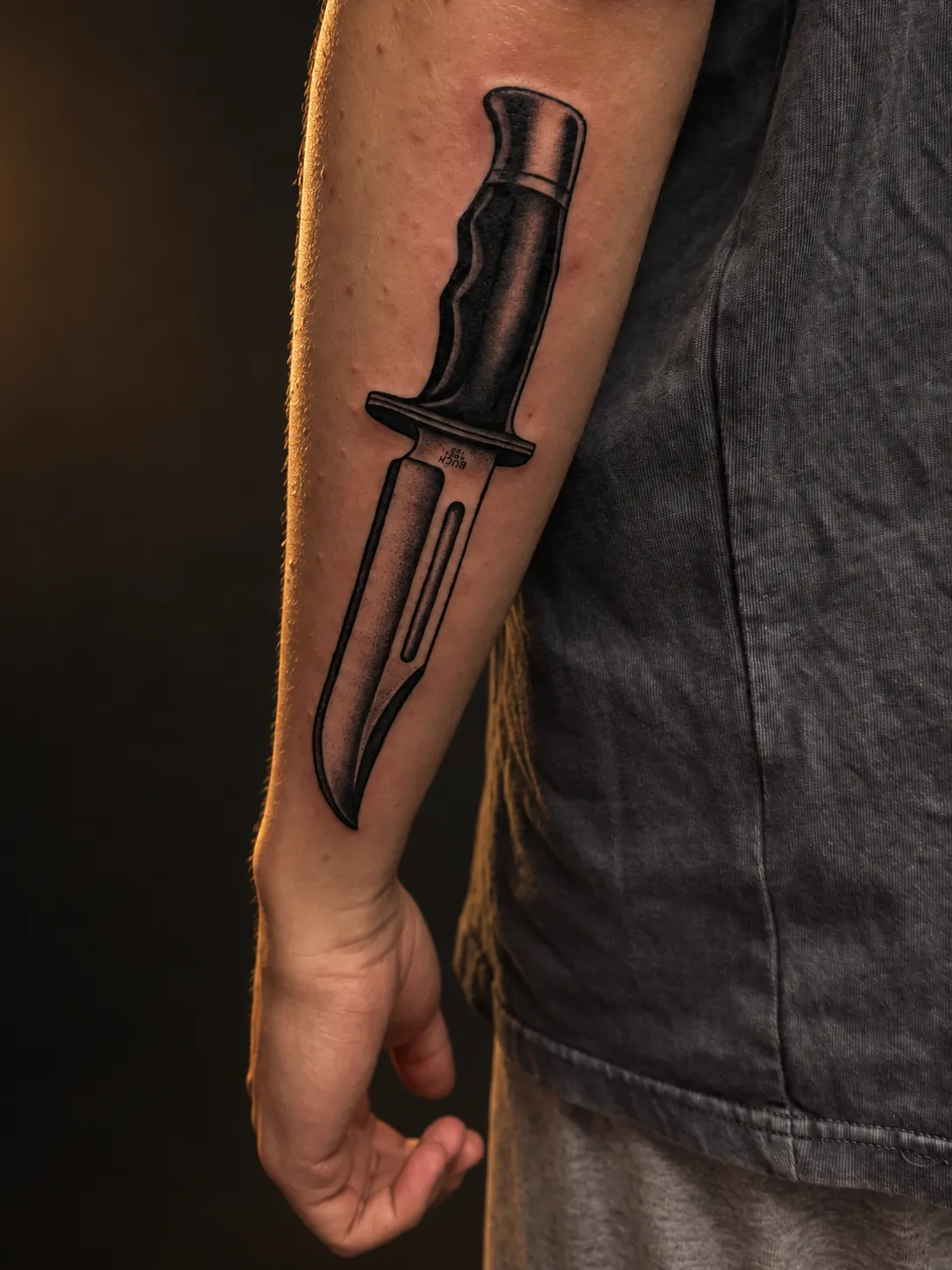 Traditional buck knife tattoo